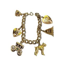 Vintage Unsigned Be My Honey Charm Bracelet (A4198) Size: 7" Color: Gold Condition: Very good vintage Signed: None Details: Cute detailed charms; wheels on carriage turns. Please look at all the photos, as they are part of the description. I try my best to point out any flaws. Also please remember this is a preloved piece and may show signs of light wear, marks, scratches, etc. I will be posting a lot more jewelry, Keep checking back. Vintage Gold Bracelets With Charms, Gold Bracelets With Charms For Vintage Collection, Antique Gold Charm Bracelet, Gold Bracelets With Charms From Vintage Collection, Vintage Antique Gold Jewelry With Charms, Gold Vintage Bracelets With Charms, Vintage Gold Bracelet With Charms, Vintage Jewelry Bracelet With Dangling Charms, Vintage Yellow Gold Charm Bracelet Gift