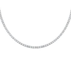 Introducing our Elegant Cubic Zirconia Tennis Necklace, a stunning piece that radiates sophistication and charm. This necklace features meticulously crafted cubic zirconia stones, each reflecting light beautifully to create a dazzling effect. The classic tennis design ensures that this necklace can effortlessly transition from day to night, making it perfect for any occasion. Whether you're dressing up for a special event or adding a touch of elegance to your everyday look, this necklace is sure Fine Jewelry Crystal Tennis Necklace In Diamond White, Fine Jewelry Cubic Zirconia Tennis Necklace With Brilliant Cut, Fine Jewelry Tennis Necklace With Brilliant Cut Cubic Zirconia, Fine Jewelry Tennis Necklace With Diamond Cut Cubic Zirconia, Dazzling Cubic Zirconia Round Cut Tennis Necklace, Dazzling Cubic Zirconia Tennis Necklace Round Cut, Dazzling Crystal Tennis Necklace With Diamond Accents, Fine Jewelry Crystal Tennis Necklace With Diamond Cut, Cubic Zirconia Tennis Necklace With Diamond Cut