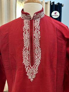 Product Description This full sleeve kurta features high-grade material with intricate embroidery details at the collar neck and placket. Short Kurta for both formal and informal use with jeans & trouser Ready to wear kurta for Man Kurta : Rose Red shade with golden embroidery on neck Pocket : Yes Fabric : Cotton Silk Actual color of the dress may slightly vary due to the screen resolution. Refer the size chart for measurements Design: SK- 1081 Elegant Long Sleeve Churidar With Intricate Embroidery, Embroidered Long Sleeve Churidar For Wedding, Raw Silk Salwar Kameez With Intricate Embroidery, Long Sleeve Raw Silk Salwar Kameez With Intricate Embroidery, Elegant Red Kurta With Zari Work, Elegant Embroidered Churidar For Transitional Seasons, Elegant Long Sleeve Zari Work Churidar, Elegant Long Sleeve Churidar With Zari Work, Red Long Sleeve Salwar Kameez For Traditional Ceremonies