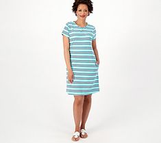 A summertime staple, this timeless T-shirt dress is an everyday option that embodies the three Cs: casual, comfortable, and cute. From Sport Savvy. Casual Cotton T-shirt Dress With Relaxed Fit, Cotton Short Sleeve Dress For Spring Day Out, Relaxed Fit Casual Dress With Crew Neck, Casual Short Sleeve Dress With Relaxed Fit For Summer, Casual Short Sleeve Summer Dress With Relaxed Fit, Casual Crew Neck Dress With Relaxed Fit, Casual Short Sleeve Mini Dress For Vacation, Casual Short Sleeve Beach Dress For Spring, Crew Neck Cotton Beach Dress