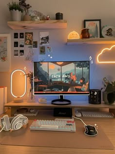 a computer monitor sitting on top of a wooden desk next to a keyboard and mouse