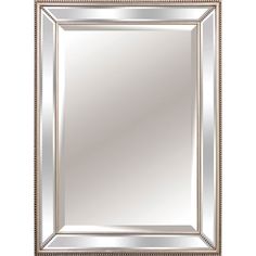 a silver framed mirror with beading around the edges and an ornate border on top