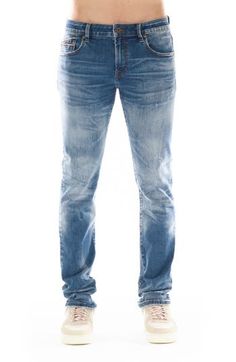 Slim-fitting stretch jeans feature a dimensional medium wash, subtle distressing and signature stitching at the back leg for an everyday edgy look. Zip fly with button closure Five-pocket style 98% cotton, 2% spandex Machine wash, line dry Imported Distressed Fitted Jeans In Medium Wash, Casual Fitted Stonewashed Jeans, Distressed Fitted Medium Wash Jeans, Fitted Rugged Jeans In Medium Wash, Fitted Stonewashed Straight Leg Jeans, Fitted Faded Distressed Jeans, Stonewashed Fitted Straight Leg Jeans, Urban Distressed Medium Wash Jeans, Medium Wash Stonewashed Denim Jeans