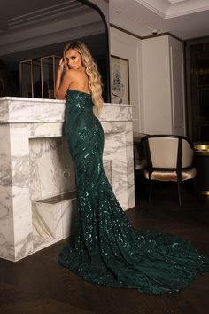 The Gianna gown in Emerald features deep green embroidered pattern sequins over deep green underlay. A classic strapless sweetheart neckline, figure-hugging bodice that flows into a mermaid sweep train exudes elegance and class. This dress will make you look and feel beautiful on a red carpet or any formal event. Note: this is a preorder/made-to-order item and will ship in 5-10 business days Emerald green embroidered pattern sequins with deep green underlay Strapless sweetheart neckline Structur Noodz Boutique, Boned Bodice, Strapless Sweetheart Neckline, Feel Beautiful, A Mermaid, Deep Green, How To Feel Beautiful, Sweetheart Neckline, Mermaid Formal Dress