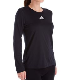 Long performance t-shirt gives you more wicking coverage with light stretch and a more cottony texture. Made of polyester. Crewneck with a smooth band. Long sleeves with smooth knit cuffs. Adidas logo at center of chest. Climalite wicking tech helps fabric breathe, shuttles moisture away and therefore dries out more quickly. Reflective detail at back right, above hem. Tag attached to inner neck. Regular fit. Adidas Women's Creator Climalite Long Sleeve Crew Neck Tee in Black (12H6) | Size Large Adidas Casual Tops For Training, Adidas Black Tops For Sports Events, Casual Breathable Adidas Tops, Adidas Stretch Tops For Gym, Adidas Crew Neck Athletic Fit Tops, Adidas Athletic Fit Crew Neck Top, Adidas Stretch Tops For Training, Adidas Crew Neck Activewear For Sports Events, Adidas Athletic Fit Breathable Tops