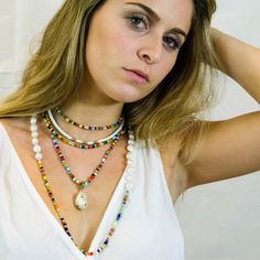 "Bright, vibrant beads make this necklace perfect addition to your summer sundress or a white blouse. African glass beads and white freshwater pearls are hand knotted along the silk cord to create a colorful and bright strand. Alone or layered with your favorites, this necklace exudes a playful, eclectic bohemian elegance. Necklace: 43\" Layer this necklace with: https://www.etsy.com/listing/637252353/baroque-pearl-and-turquoise-necklace?ref=shop_home_active_2 You might also like: https://www.et Beaded Shell Necklace For Summer Festivals, Summer Multi-strand Colorful Beaded Necklaces, Beach Season Jewelry With Beaded Chain, Summer Festival Beaded Shell Necklace, Colorful Beads Strand Jewelry For Vacation, Colorful Beaded Strand Jewelry For Vacation, Summer Beach Beaded Shell Necklace, Summer Vacation Beaded Shell Necklace, Bohemian Summer Strand Shell Necklace