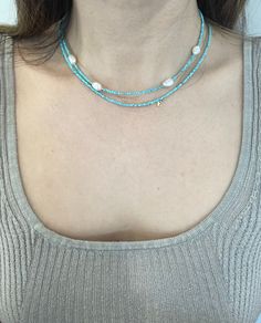 Hello :) I am so happy you stopped by! New designs are added weekly so check back often. All designs are handmade by this mommy.  Shop link ⬇️ https://enjewelrydesign.etsy.com This listing is for (1) turquoise & Pearl necklace.  DETAILS: * Sold as (1) Necklace** please check out the length before purchasing.  * Materials: Natural Turquoise Faceted Gemstone Beads with a  Fresh Water Pearls OR just turquoise beads.   Please note each pearl charm is unique and different in shape and size. And some pearls might have some imperfections.  * **Length: Approximately 15.5" (end to end, including the clasp)  - Please note fit and appearance will vary based on the individual. PLEASE READ BEFORE PURCHASING * NO RETURN/EXCHAGE  * Please contact me within 3 days of delivery if you have any issues with y Handmade Blue Turquoise Necklace For Summer, Handmade Turquoise Necklace For Summer, Handmade Turquoise Necklace As Summer Gift, Handmade Light Blue Beaded Necklace For Summer, Dainty Blue Necklaces For Summer, Turquoise Necklace For Summer Gift, Turquoise Necklace Summer Gift, Summer Turquoise Necklace For Gift, Summer Turquoise Necklace Gift