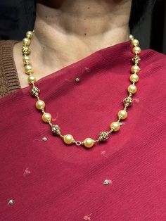 22 karat gold necklace with culture pearls 
     - 235-GN2220 - in 31.200 Grams for USD $1,964.21 USD. 
Made in India by Totaram Jewelers Online this product is in Gold - 22 Karat BIS Hallmark 916 Gold  & is an excellent gift for Adult - Women. Ships fully insured with secured guaranteed delivery for free with your order over $250 from New Jersey USA & comes with 30 days exchange policy. 22k Gold Pearl Necklace For Celebrations And Festivals, Festive Gold Pearl Necklace With Pearl Pendant, Gold Plated Temple Jewelry Pearl Necklace For Celebration, Gold Plated Pearl Necklace For Celebrations, Temple Jewelry Style, Festive Gold Plated Necklace With Pearl Chain, Yellow Gold Pearl Pendant Necklace For Celebration, Traditional Gold Pearl Drop Necklace, Festive Gold-plated Pearl Chain Necklace, Gold Pearl Pendant Necklace For Celebrations