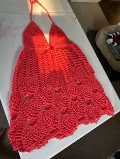 Crochet Swim suit cover up. Would fit a medium/large comfortable. Oversized on a small and tight on a XL. Fitted Crochet Cover-up For Vacation, Fitted Crochet Cover-up For Beach Season, One Size Crochet Lace Top For Beach, Stretch Crochet Triangle Top For Vacation, Stretch Pink Crochet Beach Top, Red Crochet Top For Beach, Fitted Crochet Cover-up For Spring, Red Crochet Dress For Summer Beach, Stretch Crochet Lace Top For Beach