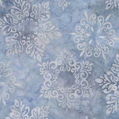 a blue and white background with an intricate design on the fabric, it is very soft