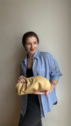 Stylish beige woman clutch. The perfect size for a wedding party, evening walk, going to a party and any other event. Beige women's clutch is always a timeless style. Unique designer women's handbag will fit perfectly into your wardrobe and will be the most favorite handbag for many looks. Size 38*18 cm, perfectly accommodates everything you need: phone, charger, cosmetics, wallet, etc. The set can be a chain in gold or silver color of your choice. I sew individually. If you want this handbag model in another size convenient for you, just note me. I can also offer you a huge selection of inner lining. The handbag will be exclusive. Dumpling clutch keeps its shape without anything inside. Material - ecoleather premium quality. Color from the photo - Beige Bag will come in a nice linen bag. Modern Beige Pouch Evening Bag, Modern Beige Clutch For Evening, Cream Pouch Clutch For Evening, Beige Evening Bag With Removable Pouch For Party, Beige Clutch Evening Bag With Removable Pouch, Beige Clutch With Removable Pouch For Party, Cream Clutch For Everyday Use, Chic Cream Clutch Pouch, Versatile Evening Pouch Clutch