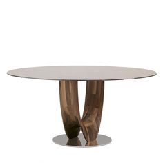 an oval glass table with wooden legs and a metal base, on a white background