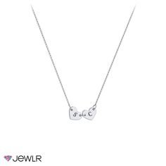 Express your personality with this engravable heart charm style. Personalize with up to 5 connecting heart charms, each engravable with an initial, and customize in sterling silver or gold. A perfect gift for youself or someone you love. Personalized White Gold Initial Necklace For Anniversary, Silver Heart Initial Necklace, Silver Heart-shaped Initial Necklace For Everyday, Silver Heart Initial Necklace For Everyday, Everyday Silver Heart-shaped Initial Necklace, Silver Heart Pendant Initial Necklace In Sterling Silver, Silver Sterling Silver Heart Pendant Initial Necklace, Initials Double Heart Jewelry For Anniversary, Personalized Initial Necklace With Heart Charm