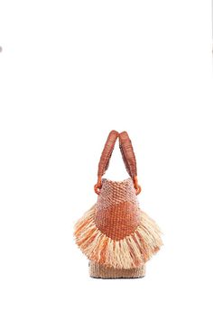 The Tia Rufﬂe is masterfully crafted in a bucket shape with fringe detailing which gives it a playful yet warm weather feel. It features a spacious interior to carry all your essentials and brings a textural element to your look. Brown Tassel Bags For Spring, Spring Bohemian Woven Bucket Bag, Casual Brown Straw Bag With Fringe, Spring Natural Bag With Tassels, Chic Bucket Shoulder Bag With Tassels, Natural Bags With Tassels For Spring, Casual Brown Straw Bag With Tassels, Spring Beige Shoulder Bag With Fringe, Spring Beige Fringe Shoulder Bag