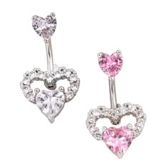 two heart shaped earrings with pink and white stones on each ear, one in the shape of a heart