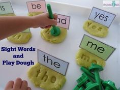 the sight words and play dough are displayed