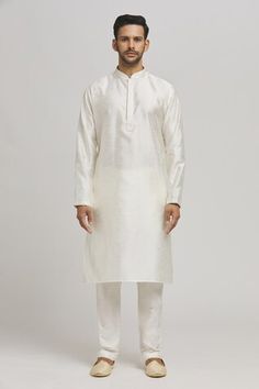 White sherwani embellished by sequins on a geometric pattern base. Comes with inner kurta and pant. - Aza Fashions Straight Kurta For Reception And Navratri, Raw Silk Kurta For Reception And Navratri, Navratri Reception Raw Silk Kurta, Straight Kurta For Diwali Reception, Festive Straight Kurta For Reception, Straight Kurta For Reception And Diwali, Bandhgala Straight Kurta For Diwali Reception, Diwali Reception Bandhgala Straight Kurta, Diwali Reception Traditional Wear Straight Kurta