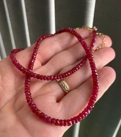 "High-quality, natural Longido Ruby necklace. The beads are faceted and the size graduates from 3mm to 4mm.  The gems are natural, with no added color.  You can have the necklace closed with a Gold Filled, Rose Gold filled, or Sterling Silver clasp. Please select your preference when ordering.  The necklace is 17\" long, plus a 2.5\" extender. If you prefer a different length, please let me know and I will make it as per your requirements. Based on the new size, the price might be different.  Sizing: Longido Ruby beads 3mm to 4mm Necklace length - 17\" + 2\" extender To view the entire collection of necklaces: https://www.etsy.com/shop/HealingGemstone?section_id=14348860&ref=shopsection_leftnav_1 To return to the store: https://www.etsy.com/shop/HealingGemstone The necklace comes in a gift Red Gemstone Rondelle Necklace, Red Faceted Rondelle Jewelry, Red Briolette Necklace With Faceted Beads, Red Rondelle Jewelry With Faceted Beads, Red Rondelle Beads Jewelry With Faceted Detail, Red Ruby Faceted Beaded Necklaces, Red Ruby Cut Beaded Necklaces, Ruby Rondelle Gemstone Necklace, Red Ruby Beaded Necklace With Faceted Details