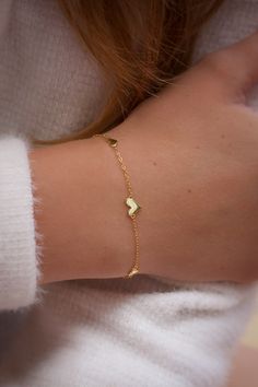 This very dainty heart bracelet makes a beautiful gift for loved ones. Available in 14K gold plated finish OR 925 sterling silver finish. Product Details - * Chain thickness - 1mm * Made from 925 sterling silver * Finish - 14K gold plated OR 925 sterling silver * Large heart size - approx 7mm x 7mm * Small heart size - approx 4.5mm x 4.5mm * Bracelet length - 19cm Packaging - Your purchase will be posted to you in a cute reusable Riptide 5 cotton pouch, within a letterbox size mailing box, so th Dainty Heart Bracelet For Valentine's Day, Heart-shaped 14k Gold Charm Bracelet, Dainty Gold Bracelet With Heart Charm For Everyday, 14k Gold Heart Bracelet For Everyday, Dainty 14k Gold Chain Bracelet With Heart Charm, Dainty Heart Charm Bracelet As Gift For Her, Dainty Heart-shaped Yellow Gold Charm Bracelet, Dainty 14k Gold Heart Bracelet, Gold Heart-shaped Sterling Silver Chain Bracelet