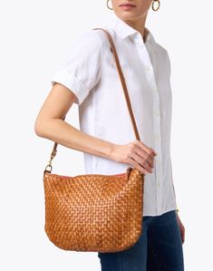 This checker shoulder bag from Clare V. is sure to be your new go-to. The messenger silhouette is crafted from hand-woven Italian leather and features both crossbody and shoulder straps so you can take it from day to night. Style yours with jeans and a tee for an effortlessly cool weekend look. Skirt And Top Dress, Work Accessories, Night Style, Clare V, Clare V., The Messenger, Day To Night, City Prints, To Night