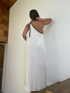 "ALLE BOHO \"GRECIA\" Beach One Shoulder Maxi Dress, features a one-shoulder dress with cotton braid adorning it, wear it as a bikini cover-up, or for a evening event, the fabric is very light and comfortable. This maxi dress is everything that you want for your next vacation. We are so proud to make Artisanal Clothing using only RAW Cotton that feels and looks very basic and natural. Our clothes do not only look natural and beautiful, but they are also made in the most natural and beautiful way One Shoulder Maxi Dress For Beach, Summer White One-shoulder Maxi Dress, Summer Beach Dress With One Shoulder And Asymmetrical Neckline, Beach One-shoulder Maxi Dress, Summer One Shoulder Dress With Asymmetrical Neckline For Beach, Summer One-shoulder Dress With Asymmetrical Neckline For Beach, One Shoulder Beach Sundress, White Beach Dress With Asymmetrical Neckline, White Asymmetrical Neckline Beach Dress