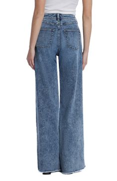 Raw hems refresh the retro style of elongating wide-leg jeans crafted from faded low-stretch denim. 32" inseam; 23" leg opening; 10 1/4" front rise Zip fly with button closure Five-pocket style 67% cotton, 27% REPREVE® recycled polyester, 5% rayon, 1% spandex REPREVE recycled polyester is made from 100% post-consumer recycled plastic bottles Machine wash, tumble dry Imported Acid Wash Denim Mid-rise Bottoms, Casual Mid-rise Wide Leg Pants With Frayed Hem, Trendy Medium Wash Flare Jeans With Five Pockets, Dark Wash Full Length Denim Flare Jeans, Faded Relaxed Fit Wide Leg Flare Jeans, Relaxed Fit Full Length Washed Jeans, Faded Wide Leg Relaxed Fit Flare Jeans, Faded Wide Leg Flare Jeans With Relaxed Fit, High Rise Washed Cropped Denim Jeans