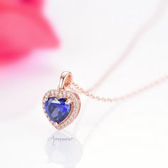 Beautiful Heart-Shaped Tanzanite Pendant Necklace ►Base Metal: Sterling Silver (925) ►Plating: 14K Rose Gold ►Accented with simulated diamonds (CZ) Center Stone: Tanzanite Shape: Heart Gemstone creation: Simulated Measurements: 9.0 mm Carat Weight: 1.8 ct. (approx.) Hardness: 8 (Mohs scale) ►Please be aware that plated jewelry can wear off over time, if this is a concern we would suggest going with the sterling silver or solid gold jewelry option ✓ Free Gift Box ✓ Free USA Shipping ✓ Free chain Heart Shape Jewelry, Tanzanite Pendant, Tanzanite Necklace, Rose Gold Accents, Heart Shaped Jewelry, Mohs Scale, Heart Gemstone, Chess Game, Vermeil Jewelry