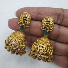 "Handmade Indian Temple Jewelry, best to wear it for traditional ceremonies or Indian wedding. This bridal jewelry has ethnic finish. It has very small Cubic Zircon stones. It is a Bollywood style one gram jewelry These Jhumka Earrings set have an excellent finish and gives out an exquisite sense of style. If you are looking for an amazing Fashion Jewelry set for special occasions such as Anniversary, Engagement, Party, Wedding or for gifting, then your search ends here.. Earring Length: 2.5\", Wedding Jhumkas With Intricate Dangle Design, Wedding Dangle Jhumkas With Intricate Design, Wedding Tilla Drop Jhumkas, Wedding Drop Jhumkas With Latkans, Wedding Jhumkas With Latkans, Wedding Drop Jhumkas, Traditional Chandbali Plug Earrings For Celebration, Gold Tilla Jhumkas For Anniversary, Wedding Chandbali Jhumkas With Matching Earrings