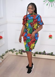 Turtle Neck Multicolor African Ankara Evening Formal Knee Length Short Sleeve Dress with Pockets, Summer Shift Dress, Women's Clothing this beautifully crafted classy, easy-to-wear ankara dress is made with 100% cotton African wax print floral fabric. it is suitable for both formal and informal occasions. Features: - 100% Handmade - Fitted with zipper at the back - Short sleeve - Pocket at both sides - Knee length - Length of dress on the model is 38inches Buyers can request customization if the measurement is different from the standard.  Production takes 3-5 business days and delivery takes 3-5 business days to most countries of the world. Standard Size Measurements are as follows: Size chart UK 4, US 0 Bust: 30 Waist: 22.5 Hip: 32.5 UK 6, US 2 Bust: 33 Waist: 25.5 Hip: 35 UK 8, US 4 Bus Red Short Sleeve Dress With Colorful Pattern, Multicolor Knee-length Dress With Vibrant Print, Multicolor Vibrant Print Dress, Fitted Multicolor Patterned Midi Dress, Multicolor Vibrant Print Knee-length Mini Dress, Multicolor Short Sleeve Mini Dress With Vibrant Print, Multicolor Knee-length Mini Dress With Vibrant Print, Vibrant Multicolor Short Sleeve Mini Dress, Colorful Fitted Dress With Colorful Pattern