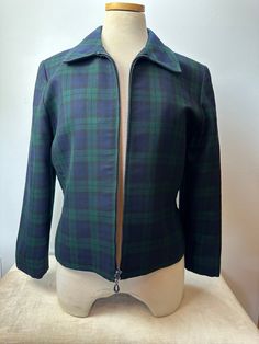 Lightweight wool plaid jacket by Pendleton. Made in the USA.  This is a bit like a modern day 49er style jacket. It's probably from the 80's or 90's I'm estimating.  Nipped, tailored waist that has cinched straps on each side.  This is 100% wool, but not a traditional thick type. Fine wool.  It zips up the front. No pockets. Fully lined.  In good shape! ✏️✏️✏️DETAILS✏️✏️✏️ Brand: Pendleton Made USA  Size on tag: 4 Fits like: Small Color:  green & dark blue  Material: 100% fine wool, zipper, lini Plaid Wool Sport Coat, Fitted Plaid Wool Sport Coat, Fitted Plaid Sport Coat With Long Sleeves, Tailored Plaid Wool Outerwear, Winter Plaid Fitted Sport Coat, Winter Fitted Plaid Sport Coat, Green Fitted Tweed Jacket For Fall, Fitted Green Tweed Jacket For Fall, Fitted Green Sport Coat For Fall