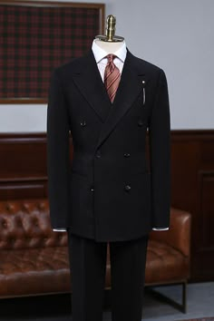 Black Double Breasted Suit With Long Sleeves, Black Double Breasted Suit For Winter, Winter Black Double-breasted Suit With Double Button Closure, Winter Black Double Breasted Suit, Black Double-breasted Suit For Work, Black Double Breasted Suit With Notch Lapel For Winter, Black Double-breasted Winter Suit With Notch Lapel, Black Double Breasted Notch Lapel Winter Suit, Tailored Black Double Breasted Winter Suit