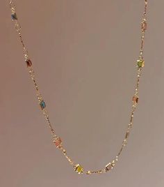 Dainty Gold Filled Necklace, fits perfectly like a choker, handmade to perfection for everyday or occasional wear. It is hypoallergenic and is measured at 9" long and 6" in width. It can be worn with other dainty jewelry or on its own. Elegant Multicolor Necklace With Delicate Chain, Dainty Gemstone Necklaces For Parties, Multicolor Delicate Chain Jewelry For Party, Multicolor Jeweled Choker Necklace, Multicolor Dainty Jewelry With Delicate Chain, Multicolor Clavicle Chain Choker As Gift, Multicolor Crystal Clavicle Necklace, Multicolor Dainty Clavicle Chain Necklace, Dainty Multicolor Clavicle Chain Necklace