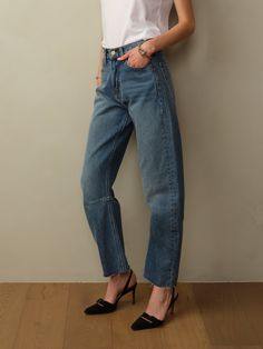 Fit: Model is wearing size 2. Mid-rise, Horseshoe leg, cropped at the ankle. Fit is true to your jean size. Material: 12oz Japanese Denim. 100% BCI Cotton. Eco Brass Buttons. Eco-Wash, using 70% less water. Care: Machine wash cold with like color. Tumble dry low. Do not bleach. Cool ironing. Origin: Made in Los Angeles, CA. Relaxed Fit Cropped Jeans In Recycled Denim, Everyday Cropped Flare Jeans In Recycled Denim, Washed Blue Cropped Jeans With Five Pockets, Medium Wash Cropped Jeans With Frayed Hem, Washed Blue Cropped Denim Jeans, Washed Blue Cropped Jeans, High Waist Medium Wash Cropped Jeans In Recycled Denim, Spring Medium Wash Recycled Denim Jeans, High Waist Medium Wash Recycled Denim Cropped Jeans