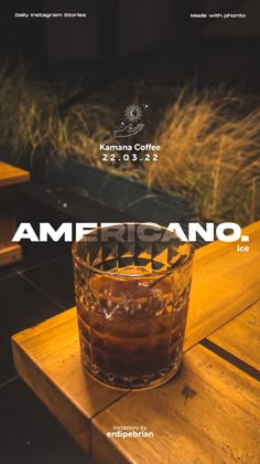 an americano drink sitting on top of a wooden table