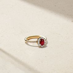 18kt Yellow Gold Red Diamond Ring With Baguette Cut, Red Ruby Ring With Diamond And Pave Setting, Classic Red Diamond Ring With Pave Setting, Red Diamond Baguette Cut Rings, Red Diamond Ring With Pave Setting, Fine Jewelry Red Diamond Ring With Pave Setting, Classic Red Diamond Ring, Baguette Cut, Red Diamond Rings With Pave Setting, Oval Ruby Diamond Ring With Pave Setting