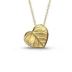 Elevate your style with our Italian 14k or 18k gold heart pendant and chain. Inspired by the beauty of nature, this exquisite heart pendant features a delicate leaf motif, infusing elegance and charm into every detail. Crafted with precision in Italy, this enchanting piece is a symbol of love and sophistication. A perfect accessory to cherish or to gift to someone special. 14k or 18k gold 20 mm high 20 mm large 18k Rolò chain chain length 45cm chain thickness 1.5mm designed and crafted in Italy Italian Engagement Ring, Italian Gold Earrings, Italian Engagement, Italian Necklace, Italian Gold Jewelry, Gold Heart Pendant, Jeweled Earrings, Leaf Motif, Heart Pendant Gold