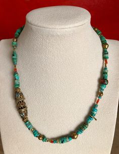 "Eclectic Turquoise Necklace w/ Beads from Nepal. Largest Bead 1.75\" Long. Natural Vintage Coral Inlaid Bead w/ Brass & Turquoise, very rare now a days. Also have an eclectic mix small natural coral with various sized brass beads. 18\" long. Upon Request I can custom make this necklace longer. I will quote a price and time required for this service. Returns only if item is received in original new condition. Buyer pays return shipping with insurance." Turquoise Spacer Beads For Festival, Artisan Turquoise Beads For Jewelry Making, Turquoise Artisan Beads For Jewelry Making, Unique Hand-strung Turquoise Beaded Necklace, Turquoise Large Beads Festival Necklace, Hand-strung Turquoise Necklace For Festivals, Bohemian Turquoise Necklace With Round Spacer Beads, Bohemian Turquoise Necklace With Spacer Beads, Bohemian Turquoise Beads With Large Beads