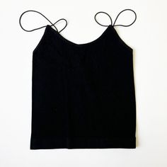 This cami tanktop is a wardrobe staple for any woman. 93% NYLON 7% SPANDEX Casual Tops With Built-in Bra And Wide Straps, Casual Camisole With Built-in Bra And Wide Straps, Trendy Tops With Built-in Bra And Tank Straps, Casual Tops With Built-in Bra And Spaghetti Straps, Summer Tops With Stretch And Wide Straps, Trendy Tank Strapped Vest Top, Trendy Tank Strap Vest Top, Chic Tops With Built-in Bra And Wide Straps, Trendy Tank Vest Top