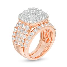 Make a bold statement of your love with this magnificent diamond double cushion frame three-piece bridal set in rose gold. Created in precious 10K rose gold The engagement ring showcases a sparkling 1/3 ct. diamond wrapped in a pair of cushion-shaped diamond-lined frames. The bold triple-row shank shimmers with multi-sized diamonds. A pair of diamond-lined wedding bands completes her ensemble. This gorgeous bridal set shines bright with 3-3/4 cts. t.w. of diamonds. Rose Gold Bridal Sets Fine Jewelry, Rose Gold Diamond Bridal Sets In Fine Jewelry, Rose Gold Diamond Bridal Set, Cushion Cut Diamond Jewelry In Rose Gold, Formal Rose Gold Diamond Bridal Sets, Rose Gold Cubic Zirconia Wedding Jewelry With Diamond Accents, Rose Gold Brilliant Cut Bridal Set For Wedding, Center Stone Engagement Ring, Bridal Engagement Rings