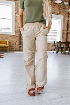 Suit up in style with Petra Parachute Pants! These pants provide a comfortable fit with their soft and lightweight parachute material that moves with your every step. Enjoy maximum freedom of movement while turning heads with their modern design! Get ready to look amazing wherever you go! Model Info: Models are 5'7", Size 2, wearing smalls Fabric: 100% nylon Pants Large, Freedom Of Movement, Large Black, Parachute Pants, Casual Pants, Comfort Fit, Turn Ons, Pants, How To Wear