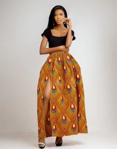 Say Hello! to our Achol maxi skirt, the African fusion skirt that will make you feel like you're living in a colourful world! With a high slit  and high waist 3 inch waist band, it's perfect for girls on the go. It's full of life and adventure and is always up for anything! Description - Pleated waistline - Side pockets  - High right slit - Back invisible zipper  - Half lined for added comfort  - 2.5 inches waist band - Floor length - Made in Cameroon - Fabric from Benin Care instructions - Hand African Skirt, Maxi Rock, African Skirts, Womens Skirts, Invisible Zipper, African Print, Waist Band, Say Hello, Floor Length