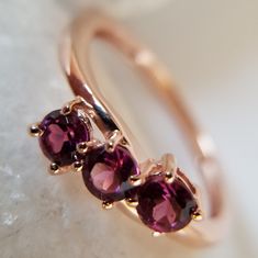 Premium, Purple Garnet, 3 Stone Ring. Vermeil Rg Over Sterling Silver. Size (5) And (6) .(0.70) Ctw. Garnet Rounds. (3.5) Mm. Petite, Perfect For Young Lady. Great Pinky Ring. Feminine, January Birthstone. Beautiful Purple, Wine, Pink. Hues. The Color Purple. New Gift Box Included. Purple Garnet, The Color Purple, 3 Stone Ring, Purple Wine, 3 Stone Rings, January Birthstone, Garnet Ring, Garnet Rings, Pinky Ring