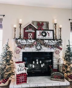 a fireplace decorated for christmas with holiday decorations