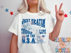 a woman with blonde hair wearing a white t - shirt that says just skatatin through the life of the usa