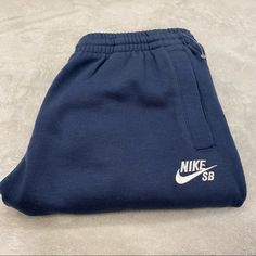 Thanks For Looking At Onemanlyshop And More!!! New Nike Sb Sweat Shorts, Dark Blue Youth 12-13 Large, If You Have Any Questions Please Feel Free To Ask Thanks. Blue Sportswear Bottoms With Letter Print, Nike Navy Bottoms For Streetwear, Nike Blue Sweatpants With Pockets, Blue Cotton Sportswear Bottoms, Nike Bottoms With Letter Print For Streetwear, Nike Streetwear Bottoms With Letter Print, Blue Letter Print Short Bottoms, Blue Short Bottoms With Letter Print, Nike Blue Cotton Pants