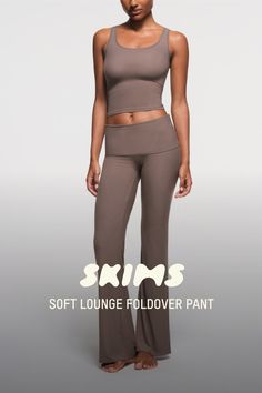 This soft, smooth, and stretchy ribbed pant features a throwback-inspired flare with a foldover waistband. | SKIMS Foldover Pants | Purple | Small | Soft Lounge Skims Foldover Pants, Kardashian Lounge Wear, Foldover Pants, Skims Outfit, Wishlist 2024, Xmas 2024, Oc Inspo, Lounge Set, Lounge Sets