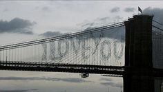 an image of the brooklyn bridge in new york city, with words written on it