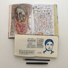 an open book with drawings and writing on it