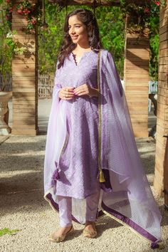 Purple kurta with all over sequin embroidery and geometric pattern. Paired with cigarette pants and embroidered dupatta.
Component: 3
Pattern: Embroidered
Type Of Work: Sequin
Neckline: V neck
Sleeve Type: Three quarter
Fabric: Georgette
Color: Purple
Other Details: 
Side slits of pants
Tassel edge dupatta
Attached lining
Closure: Elastic
Occasion: Puja - Aza Fashions Festive Straight Kurta Pant Set With Mirror Work, Festive Pant Set With Mirror Work And Straight Kurta, Purple Straight Kurta Set With Mirror Work, Fitted Festive Pant Set With Dupatta, Designer Straight Kurta Pant Set With Mirror Work, Designer Chanderi Pant Set With Mirror Work, Designer Mirror Work Straight Kurta Pant Set, Festive Semi-stitched Pant Set With Mirror Work, Festive Chanderi Pant Set With Mirror Work