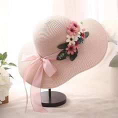 Description: Whether you are preparing to go out on a beautiful nature picnic date, going out to an outdoor wedding ceremony, or preparing for your vacation at the beach, this is the gorgeous sun hat for you! It is artistically designed with intricate details of beautiful flowers, and a sturdy straw hat, for you to enjoy in the many years to come! Details: OZYC Women's Fashion Spring Summer Flower Straw Hat Exquisite Floral Straw Dressy Outdoor Wedding Vacation Beach Hat Floral Bow Sun Hat for W Whimsical Brimmed Sun Hat For Summer, Pink Summer Sun Hat For Garden Party, Pink Sun Hat For Spring Beach, Adjustable Pink Sun Hat For Vacation, Adjustable Flower Sun Hat For Spring, Bohemian Spring Hats With Uv Protection, Bohemian Spring Hat With Uv Protection, Bohemian Adjustable Boater Hat For Summer, Adjustable Bohemian Boater Hat For Summer